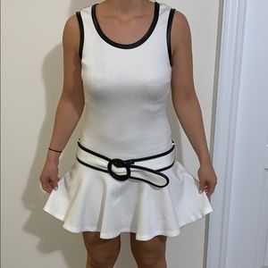 White dress with black leather edges